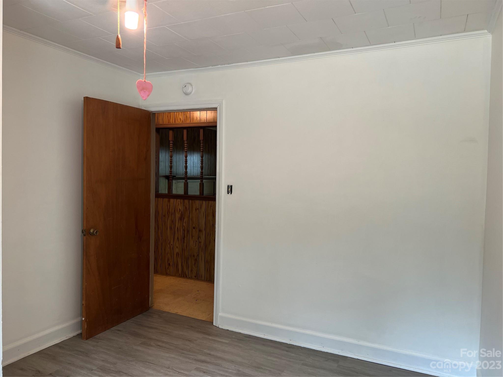 4982 Tabernacle Road Lancaster, SC 29720 - Photo 14 of 22 an empty room with wooden floor