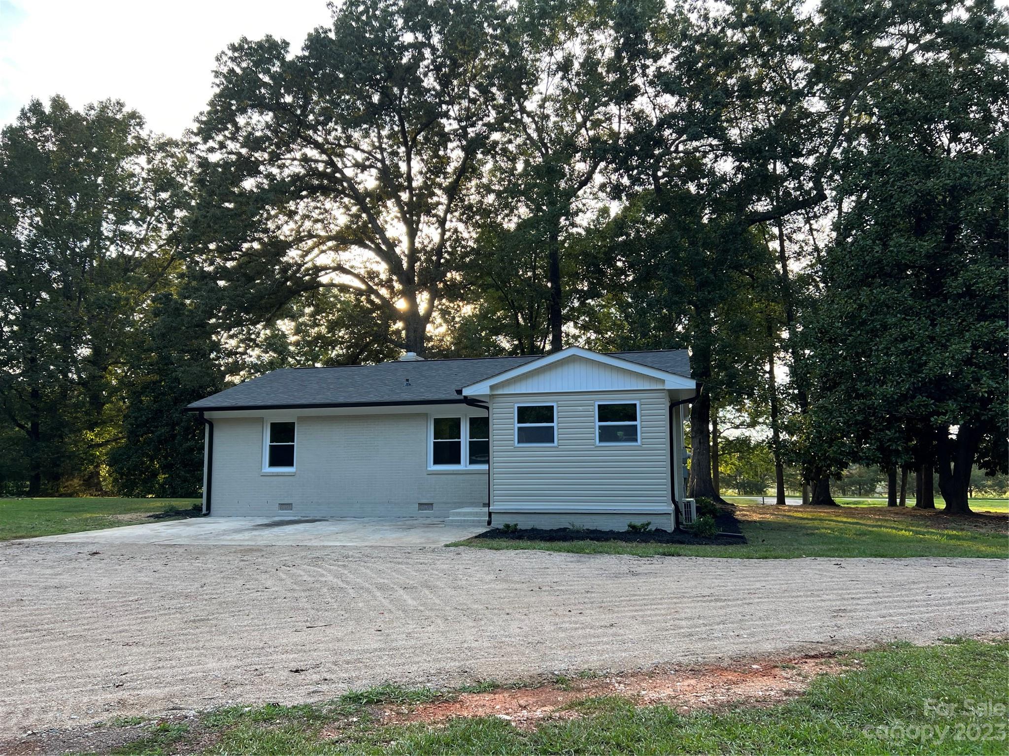 4982 Tabernacle Road Lancaster, SC 29720 - Photo 4 of 22 a front view of house with yard and trees