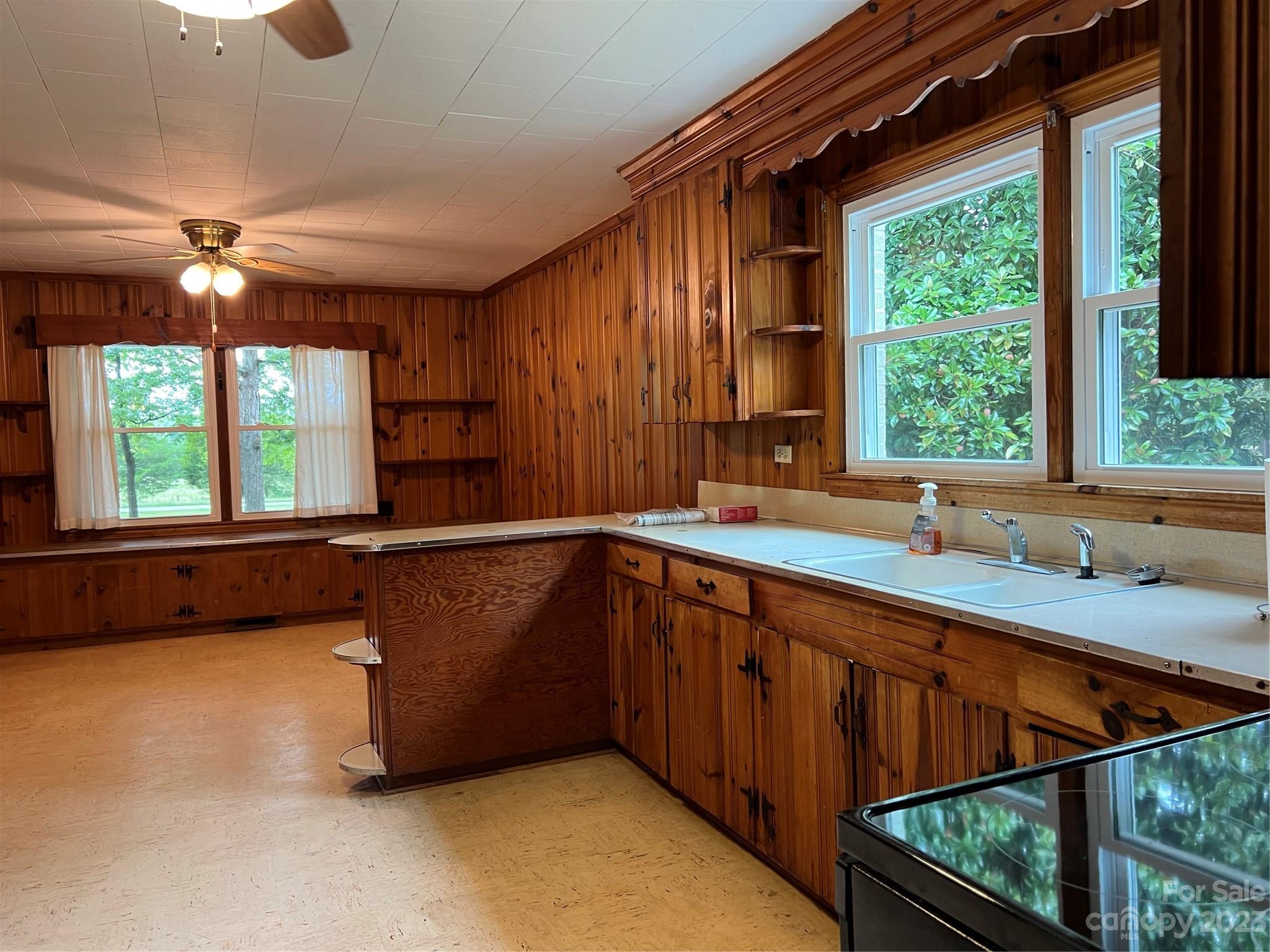 4982 Tabernacle Road Lancaster, SC 29720 - Photo 8 of 22 a view of a large kitchen with a sink and window