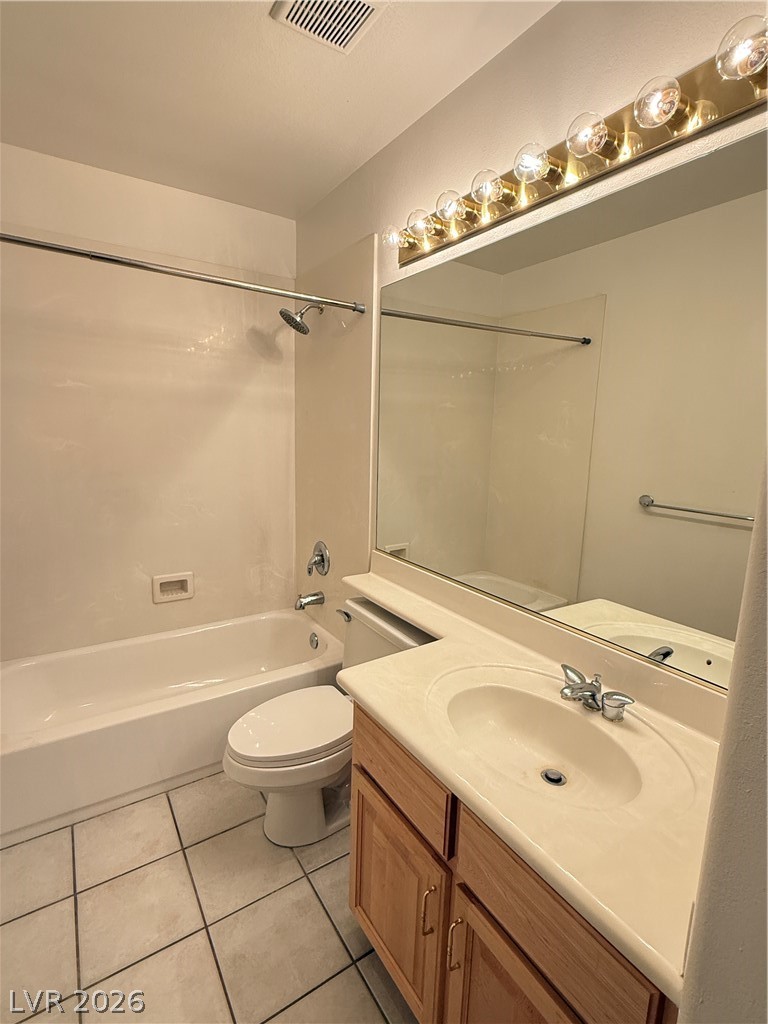 10975 Calcedonian Street Las Vegas, NV 89141 - Photo 13 of 25 This bathroom features a well-maintained vanity with a sink, a toilet, and a shower area.