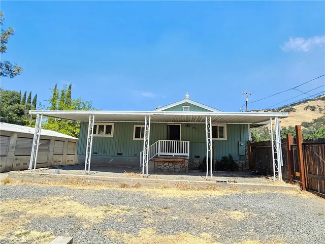 a front view of a house with a garage