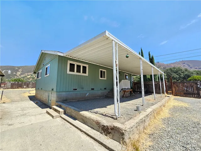 a front view of a house with a glass door