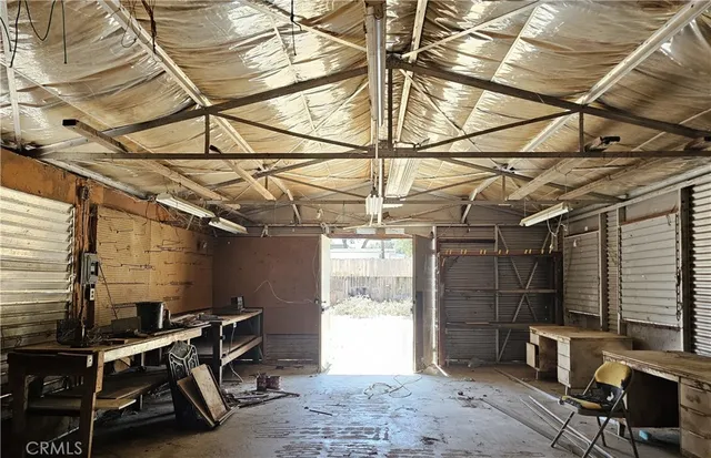 a view of a back yard of the house