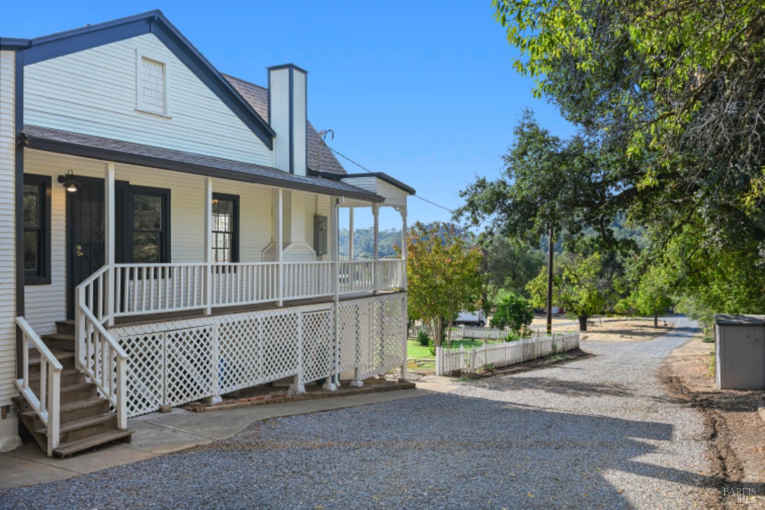 31258 Highway 128 Cloverdale, CA 95425 - Photo 17 of 88 a view of a house with a wooden fence