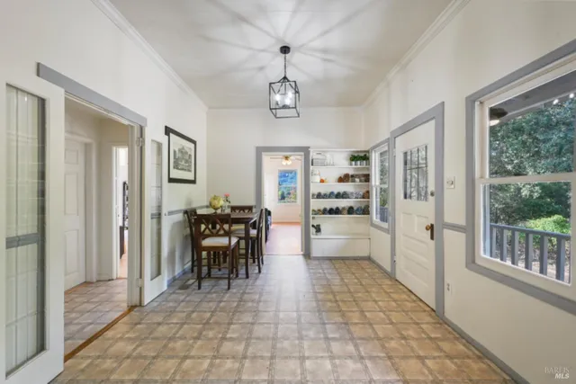 a view of a tree in front of a house