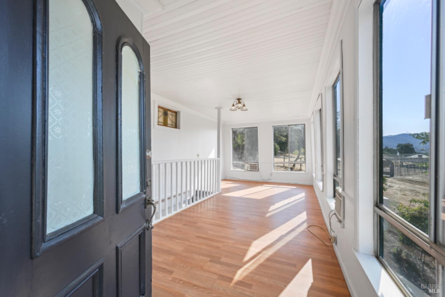 31258 Highway 128 Cloverdale, CA 95425 - Photo 30 of 88 a bed sitting in a bedroom next to a window