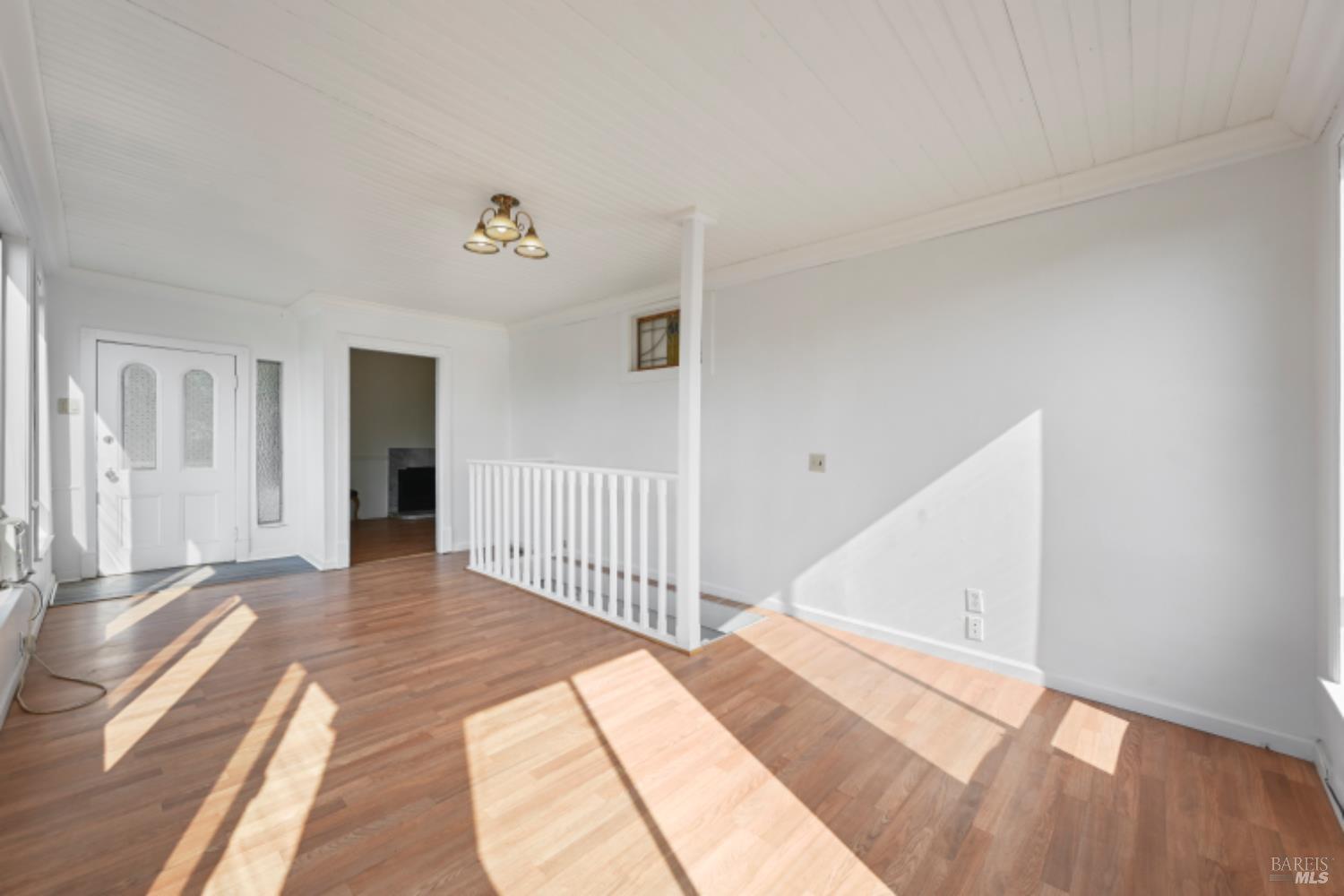 31258 Highway 128 Cloverdale, CA 95425 - Photo 33 of 88 a view of a hallway with wooden floor and stairs