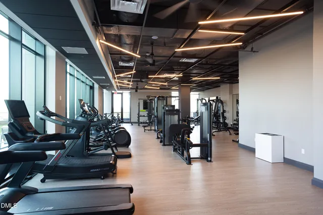 a view of living room with furniture and flat screen tv