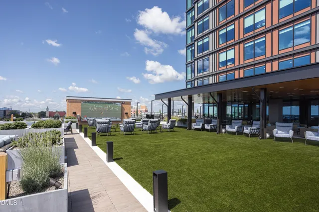 a view of a terrace with sitting area