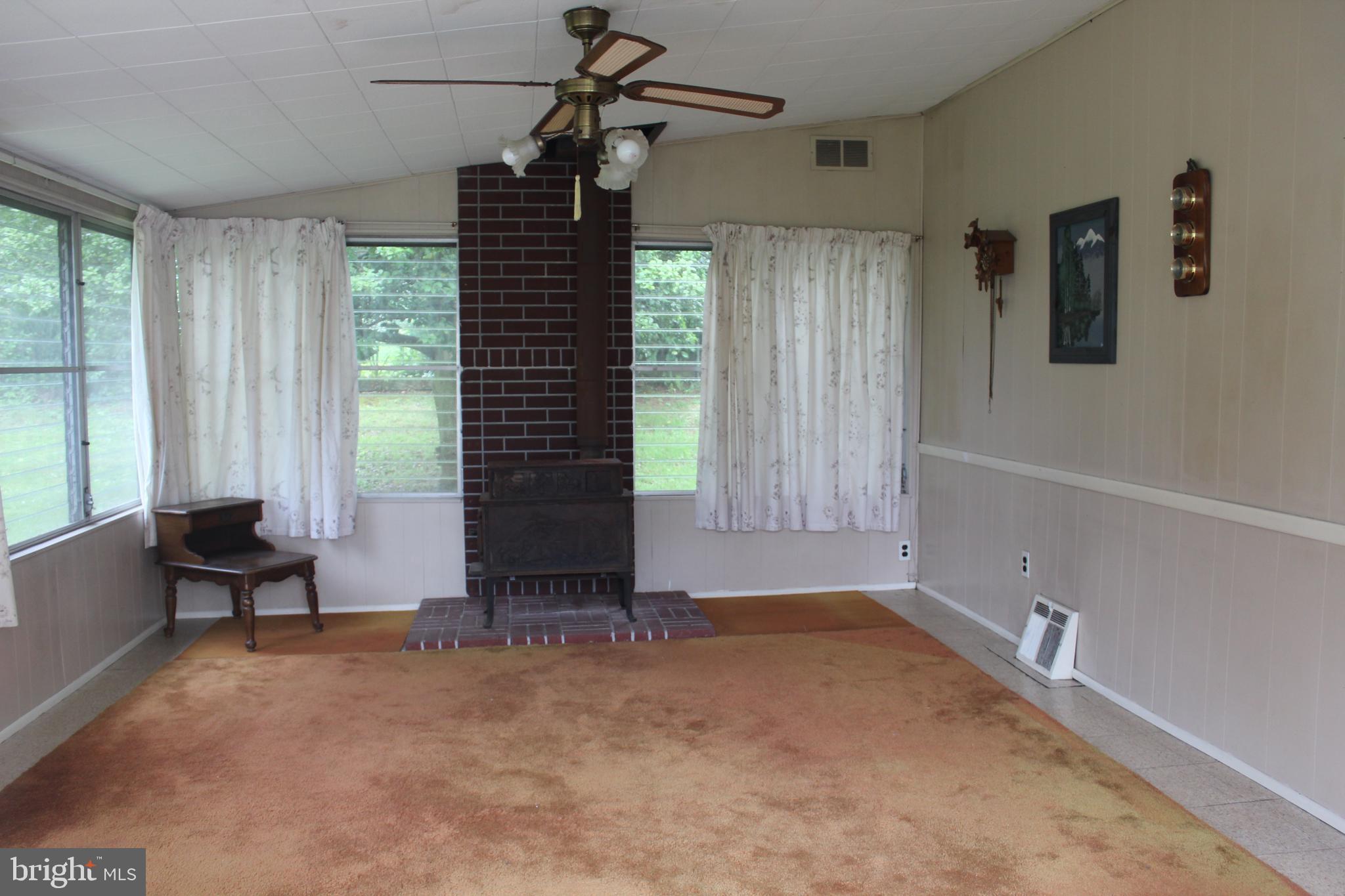 610 Paddock Road Southampton, PA 18966 - Photo 8 of 18 Sunroom with fireplace