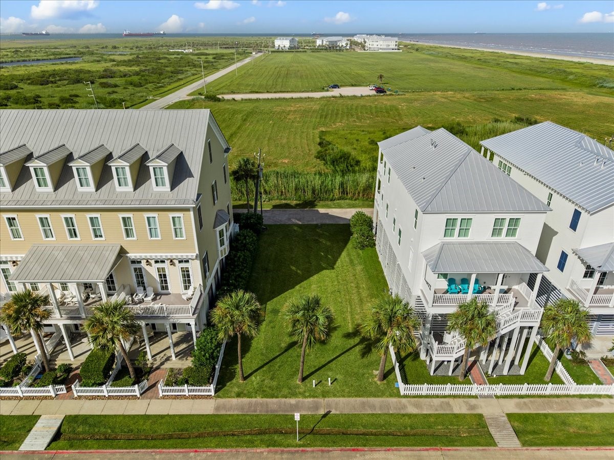 an aerial view of a house having swimming pool