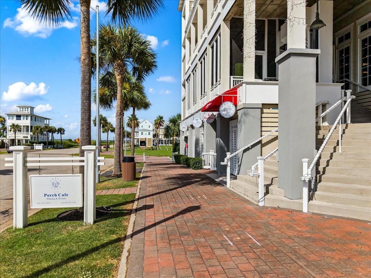 726 Positano Road Galveston, TX 77550 - Photo 13 of 20 a multi story building with yard and entertaining space