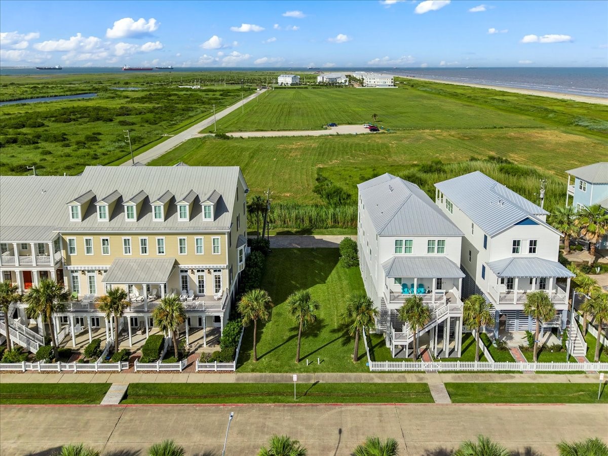 726 Positano Road Galveston, TX 77550 - Photo 4 of 20 a view of swimming pool with an outdoor space and seating area