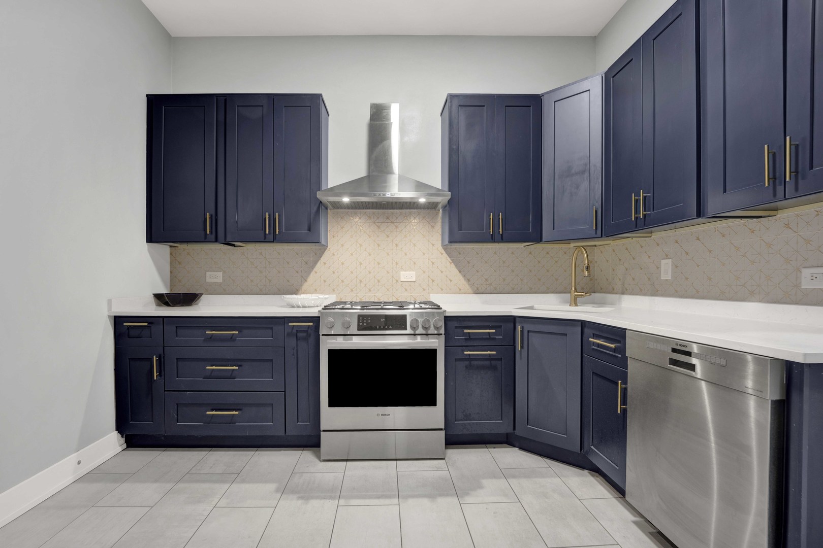 3806 South Indiana Avenue Chicago, IL 60653 - Photo 14 of 35 a kitchen with stainless steel appliances granite countertop wooden cabinets and stove