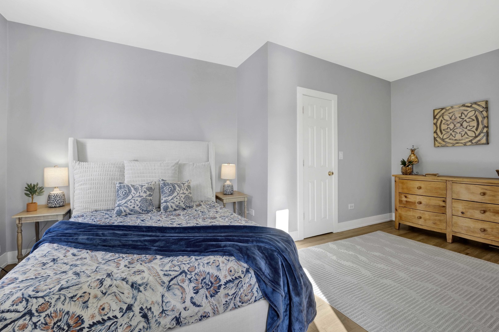 3806 South Indiana Avenue Chicago, IL 60653 - Photo 22 of 35 a bedroom with a bed and a dresser