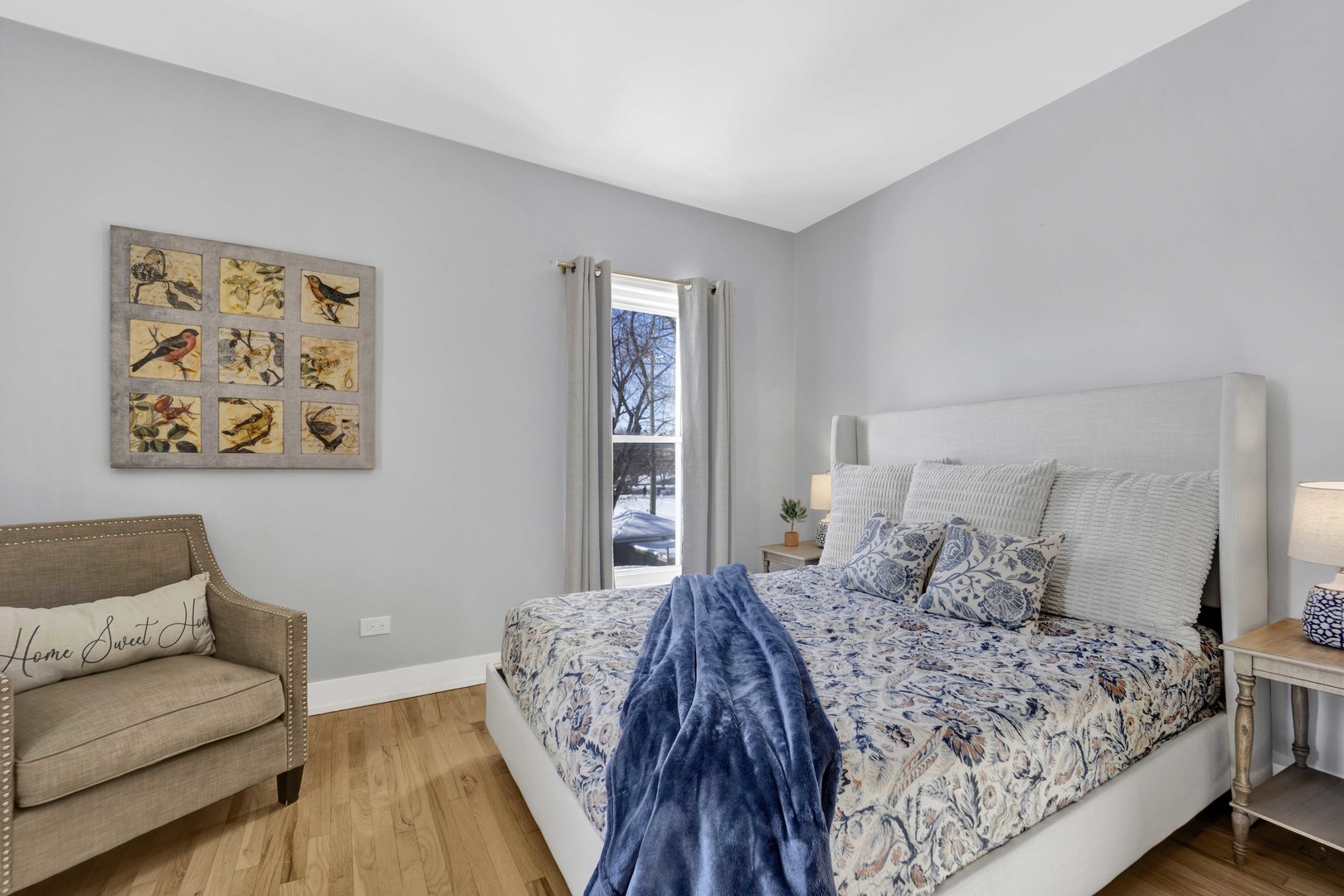 3806 South Indiana Avenue Chicago, IL 60653 - Photo 22 of 35 a bedroom with a bed and a couch