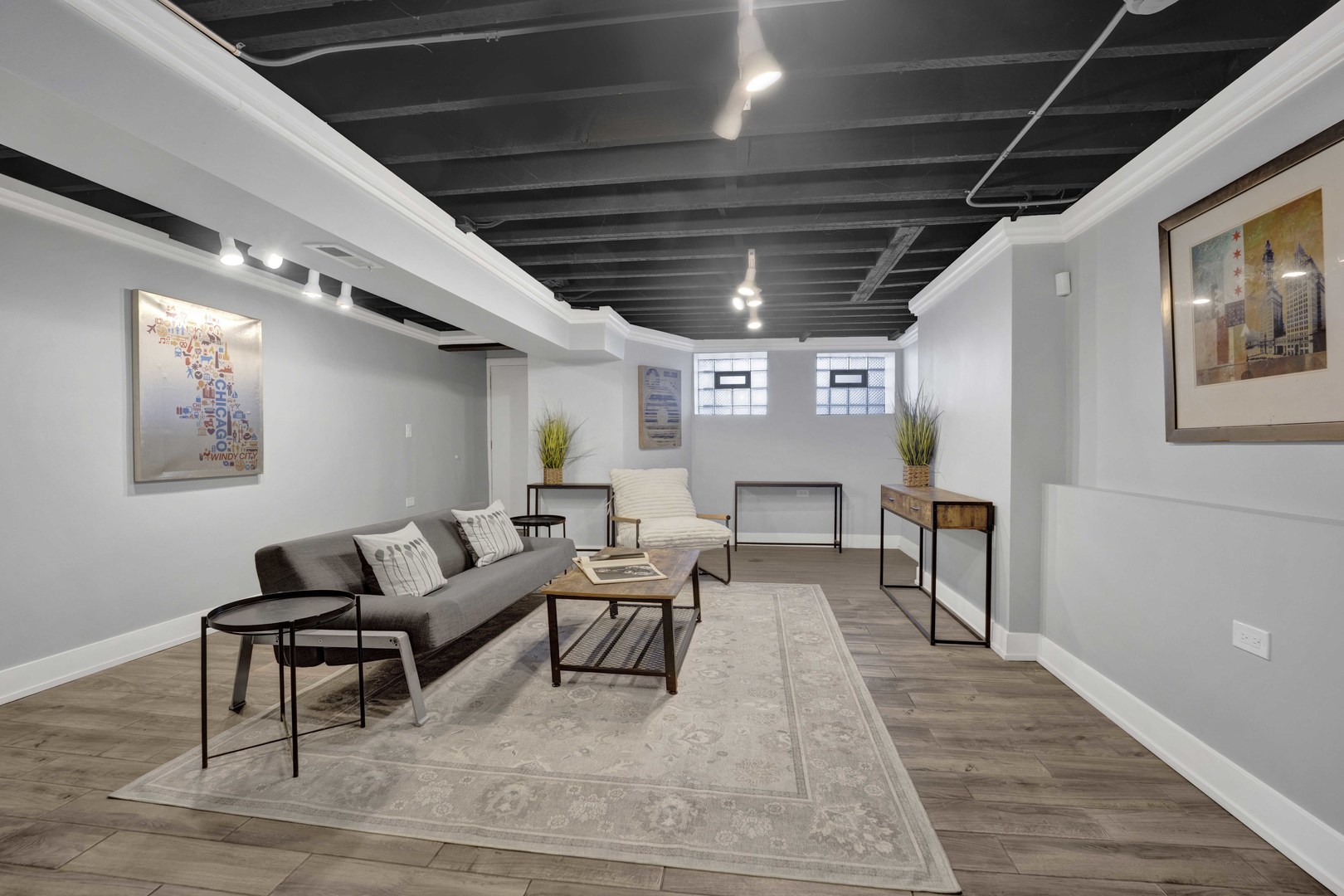 3806 South Indiana Avenue Chicago, IL 60653 - Photo 34 of 35 a living room with furniture and a wooden floor