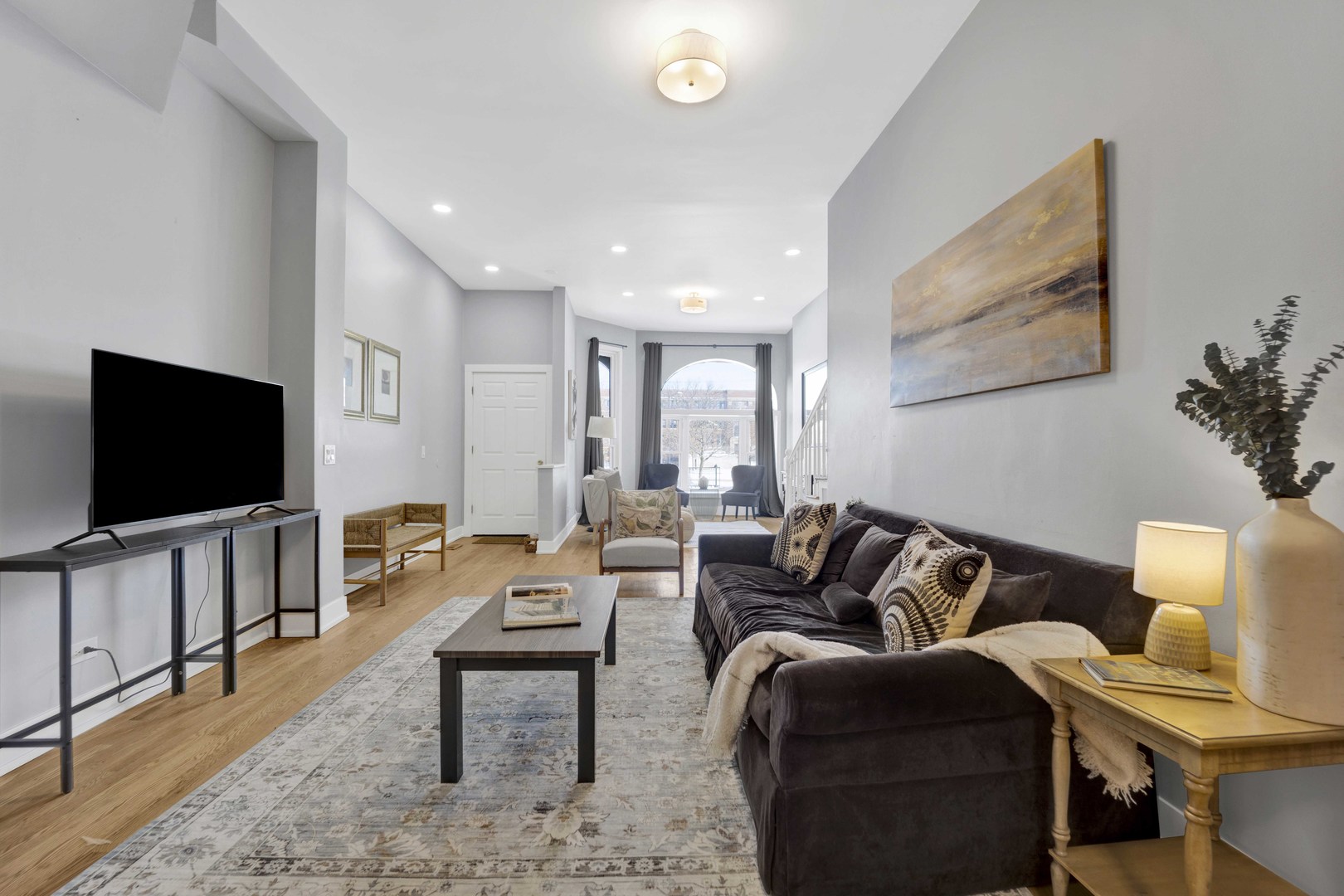 3806 South Indiana Avenue Chicago, IL 60653 - Photo 7 of 35 a living room with furniture and a flat screen tv