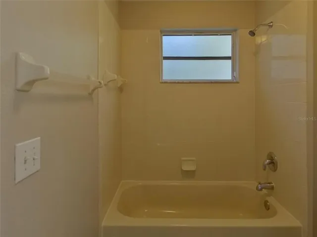 a bathroom with a bathtub