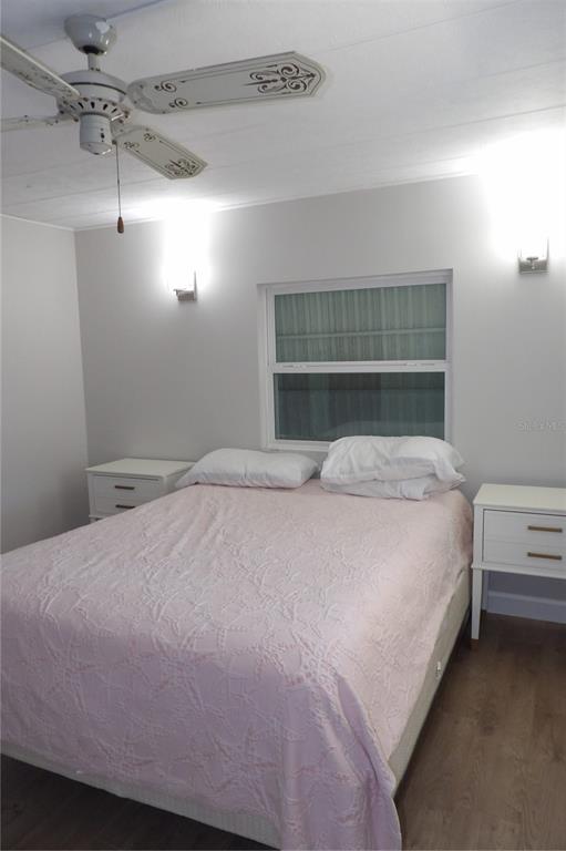 6608 Roosevelt Drive Port Richey, FL 34668 - Photo 23 of 39 a bedroom with a bed and a window