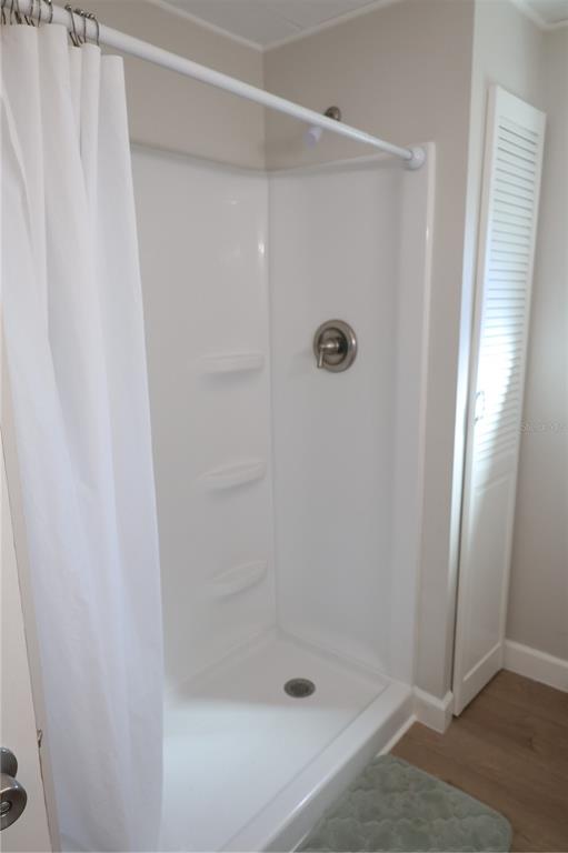 6608 Roosevelt Drive Port Richey, FL 34668 - Photo 25 of 39 a bathroom with a shower