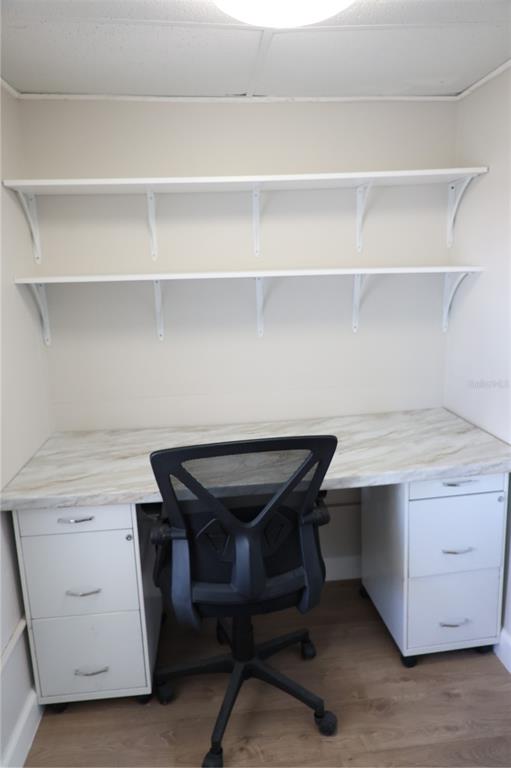 6608 Roosevelt Drive Port Richey, FL 34668 - Photo 9 of 39 a room with a table and a chair