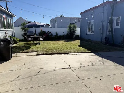 a view of a street with houses