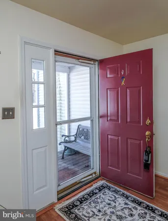 a view of a livingroom with wooden floor