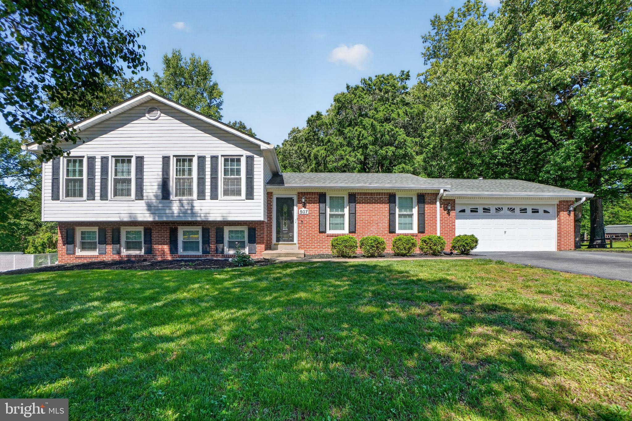 507 Clarks Run Road La Plata, MD 20646 - Photo 31 of 49 Charming split-level home with lush greenery.