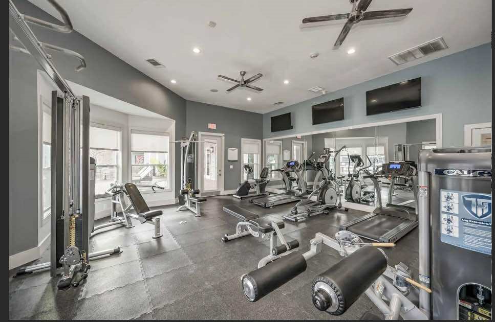529 Barker-Clodine Road, Unit CYPRESS Houston, TX 77094 - Photo 16 of 21 a view of a room with gym equipment