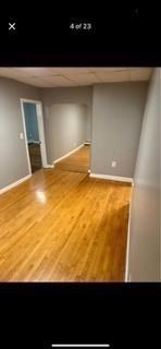 22 Sachem Street Fall River, MA 02724 - Photo 11 of 11 a view of empty room with wooden floor
