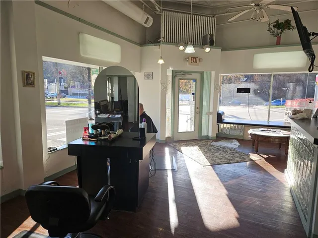 a view of a living room and dining room