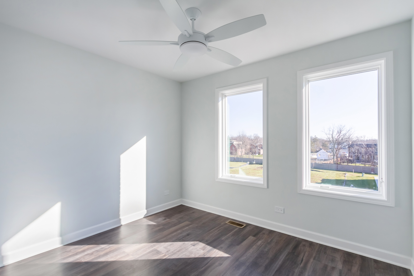 1239 Shermer Road Northbrook, IL 60062 - Photo 15 of 25 a view of an empty room with wooden floor and a window