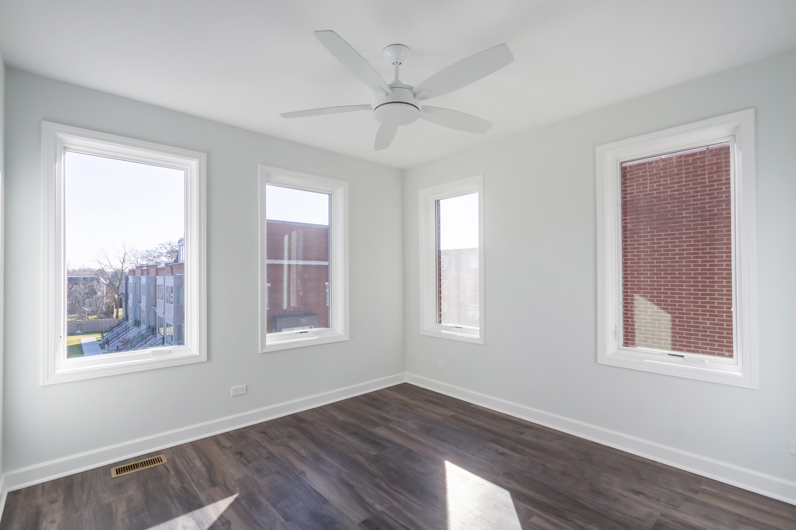 1239 Shermer Road Northbrook, IL 60062 - Photo 16 of 25 a view of an empty room with wooden floor and a window