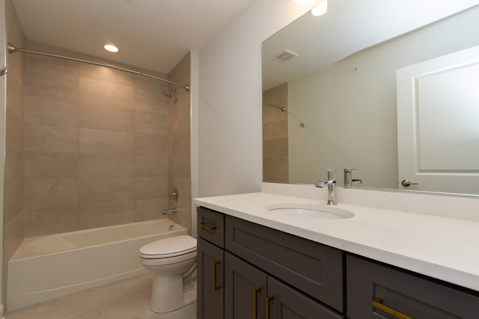 1239 Shermer Road Northbrook, IL 60062 - Photo 17 of 25 a bathroom with a sink a toilet and shower