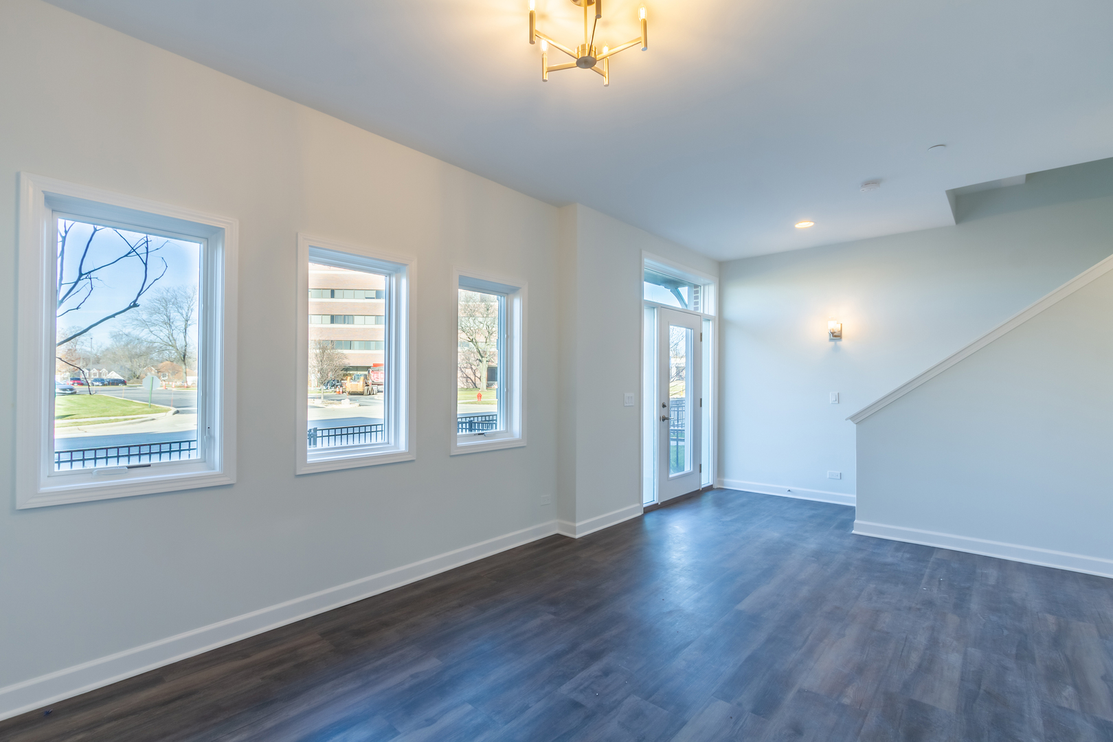 1239 Shermer Road Northbrook, IL 60062 - Photo 21 of 25 a view of an empty room with wooden floor and a window