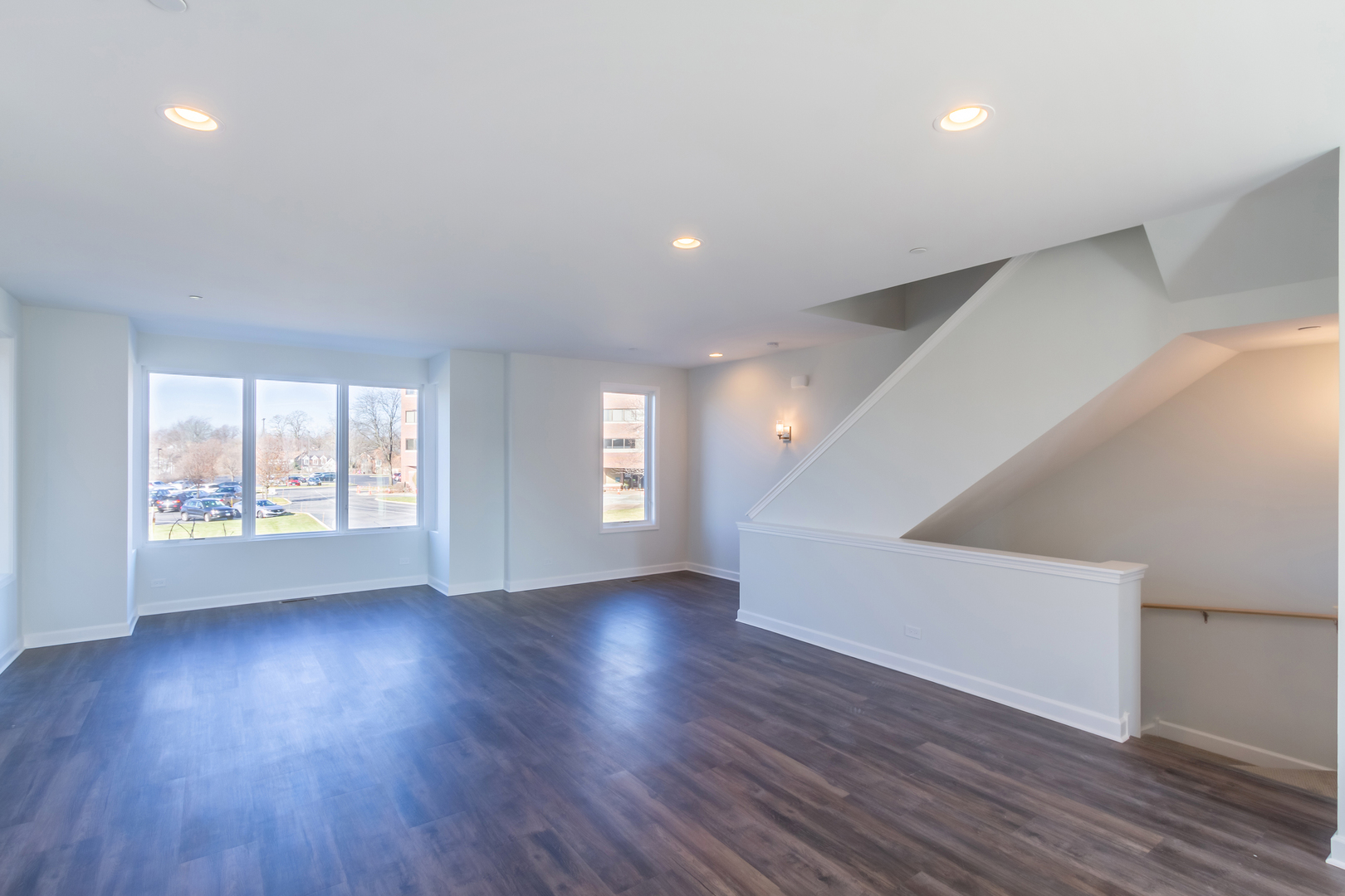 1239 Shermer Road Northbrook, IL 60062 - Photo 5 of 25 a view of an empty room with wooden floor and a window
