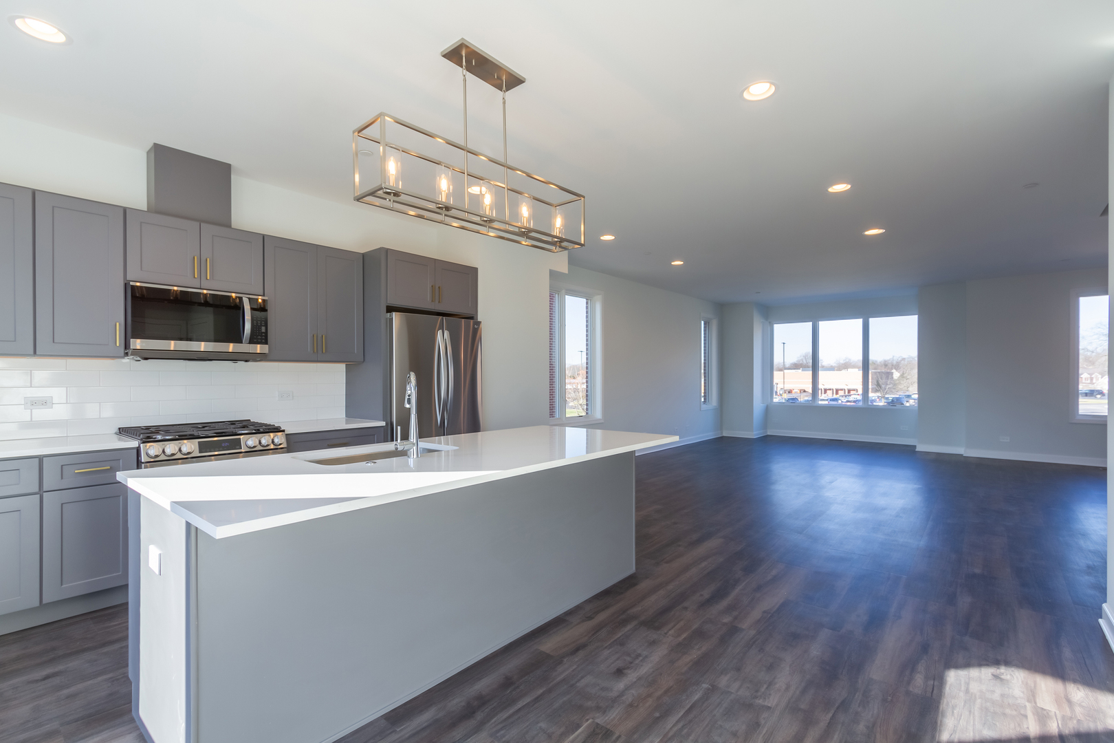 1239 Shermer Road Northbrook, IL 60062 - Photo 8 of 25 a view of a kitchen counter space a sink and wooden floor