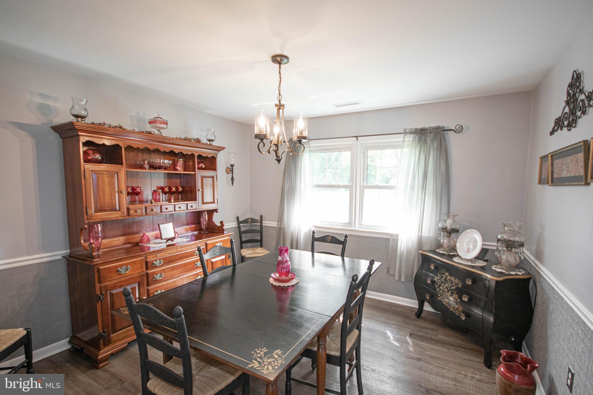 3239 Boone Road Crisfield, MD 21817 - Photo 11 of 59 Dining Room with chair rail and decorative walls.