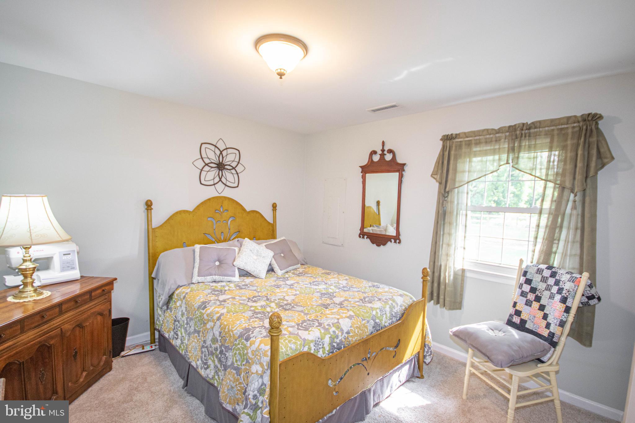 3239 Boone Road Crisfield, MD 21817 - Photo 21 of 59 Comfortable 2nd bedroom with carpeted floor
