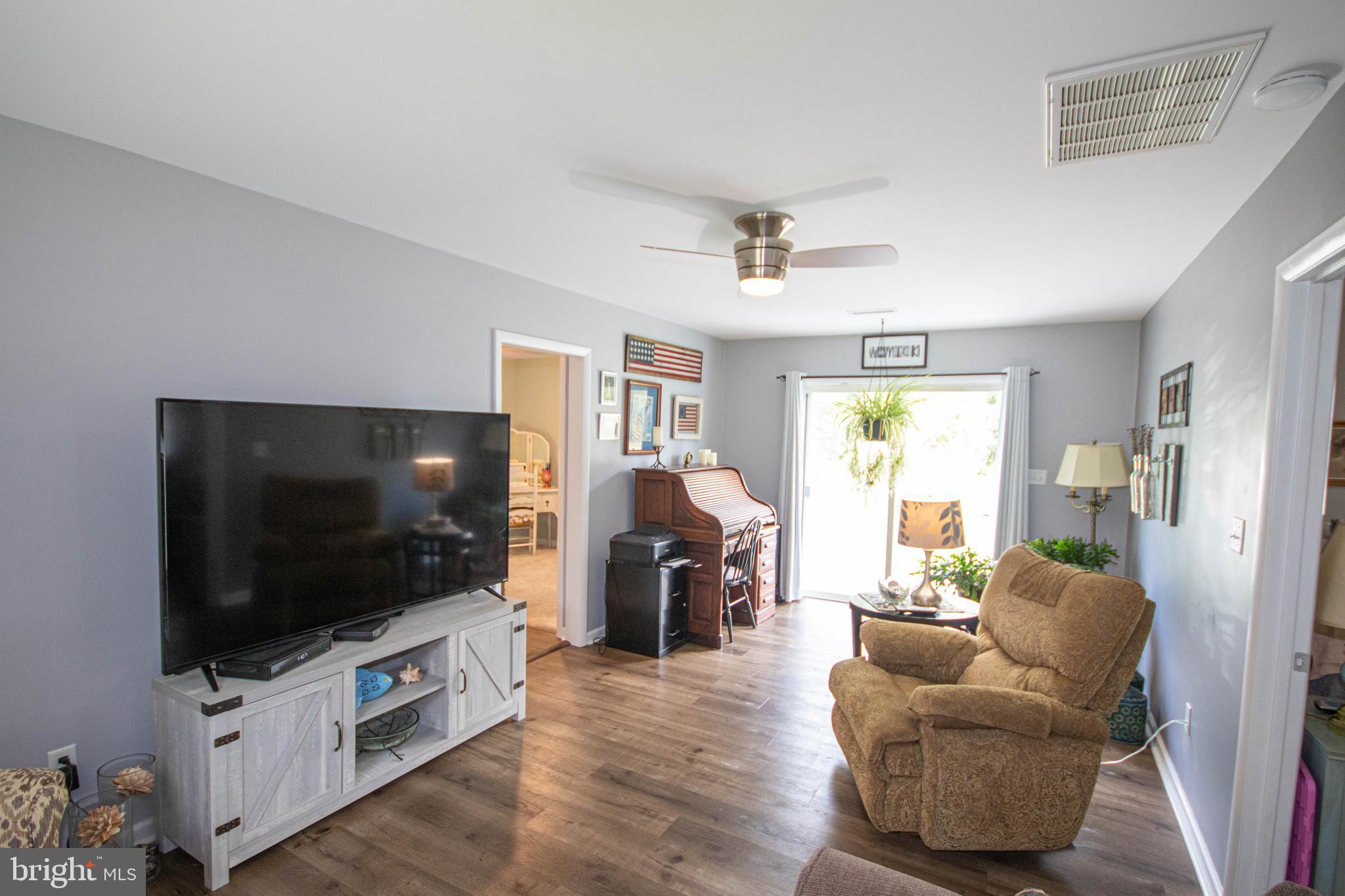 3239 Boone Road Crisfield, MD 21817 - Photo 29 of 59 The sliding door opens to a deck facing the front