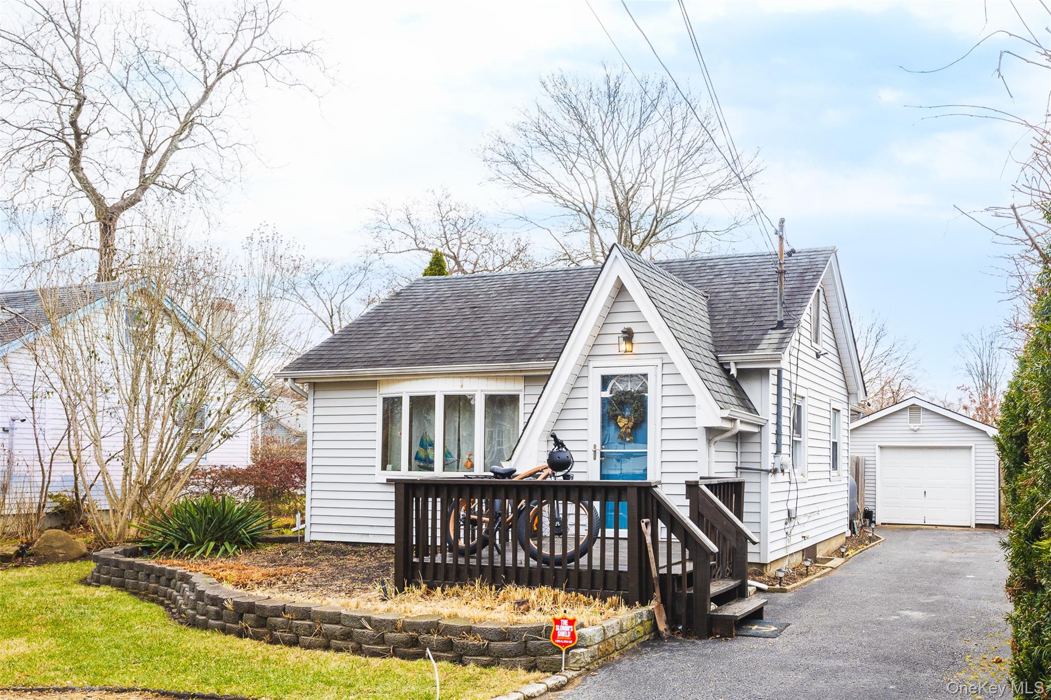 a view of house with a yard outdoor seating and barbeque oven
