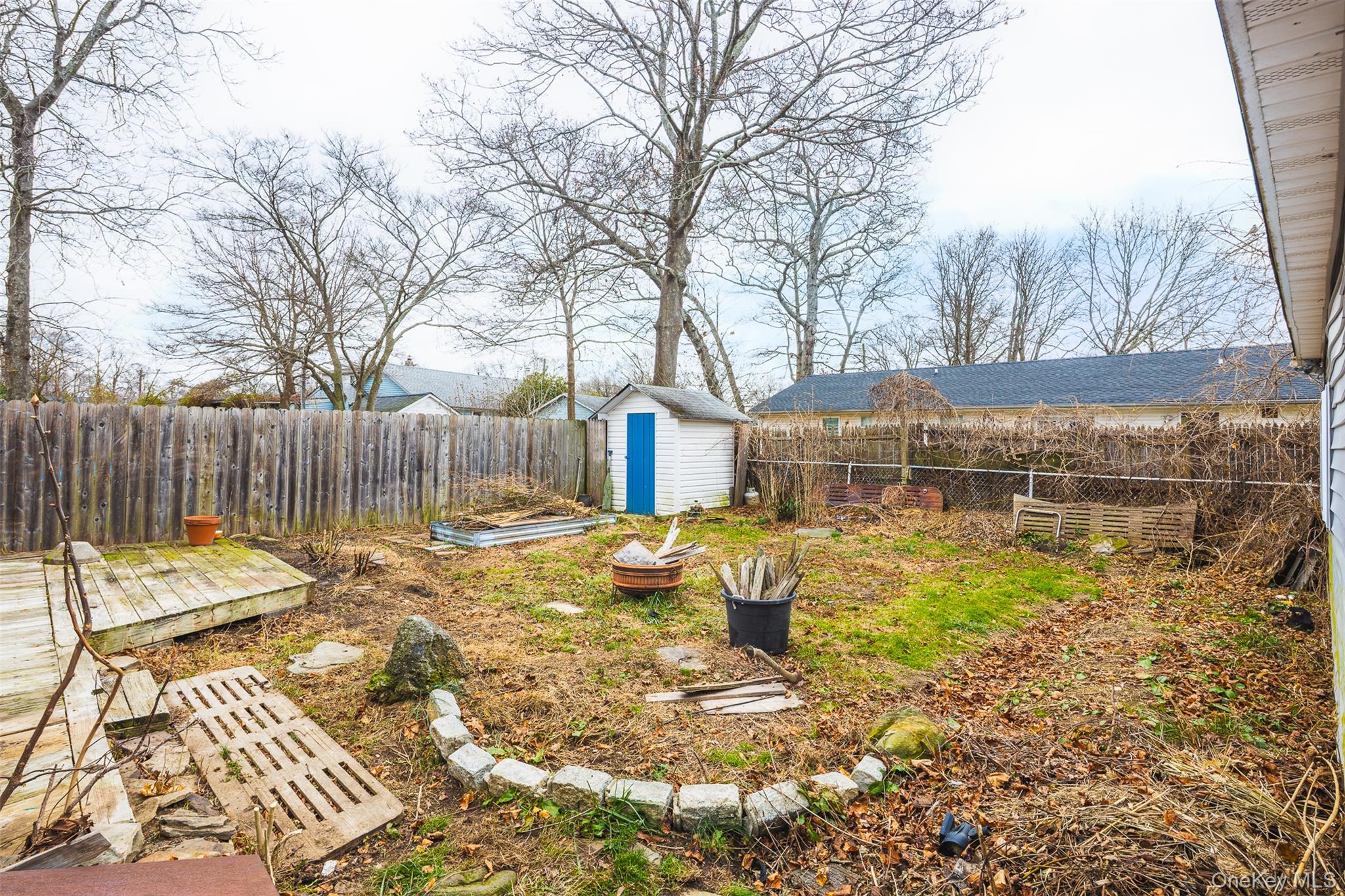 278 Elm Road West Mastic Beach, NY 11951 - Photo 10 of 14 a view of a swimming pool with a patio
