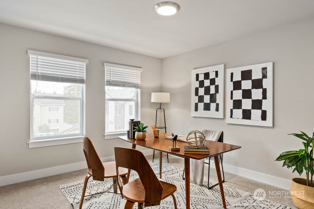 23833 9th Avenue Southeast, Unit B 19 Bothell, WA 98021 - Photo 30 of 32 a view of a dining room with furniture and windows