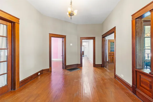 a view of a livingroom with wooden floor