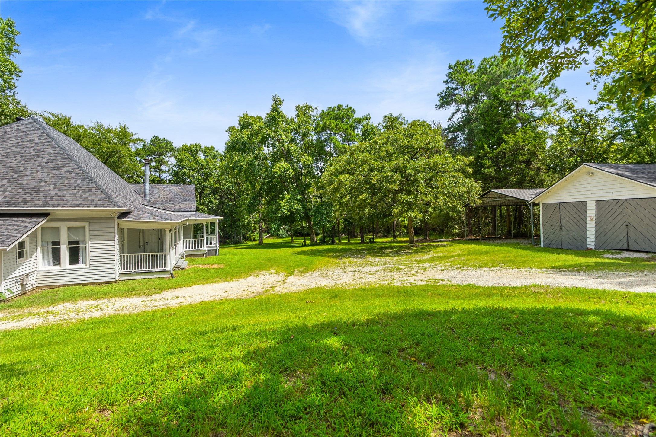 38 Darrell White Road Huntsville, TX 77340 - Photo 31 of 49 a front view of house with yard and green space