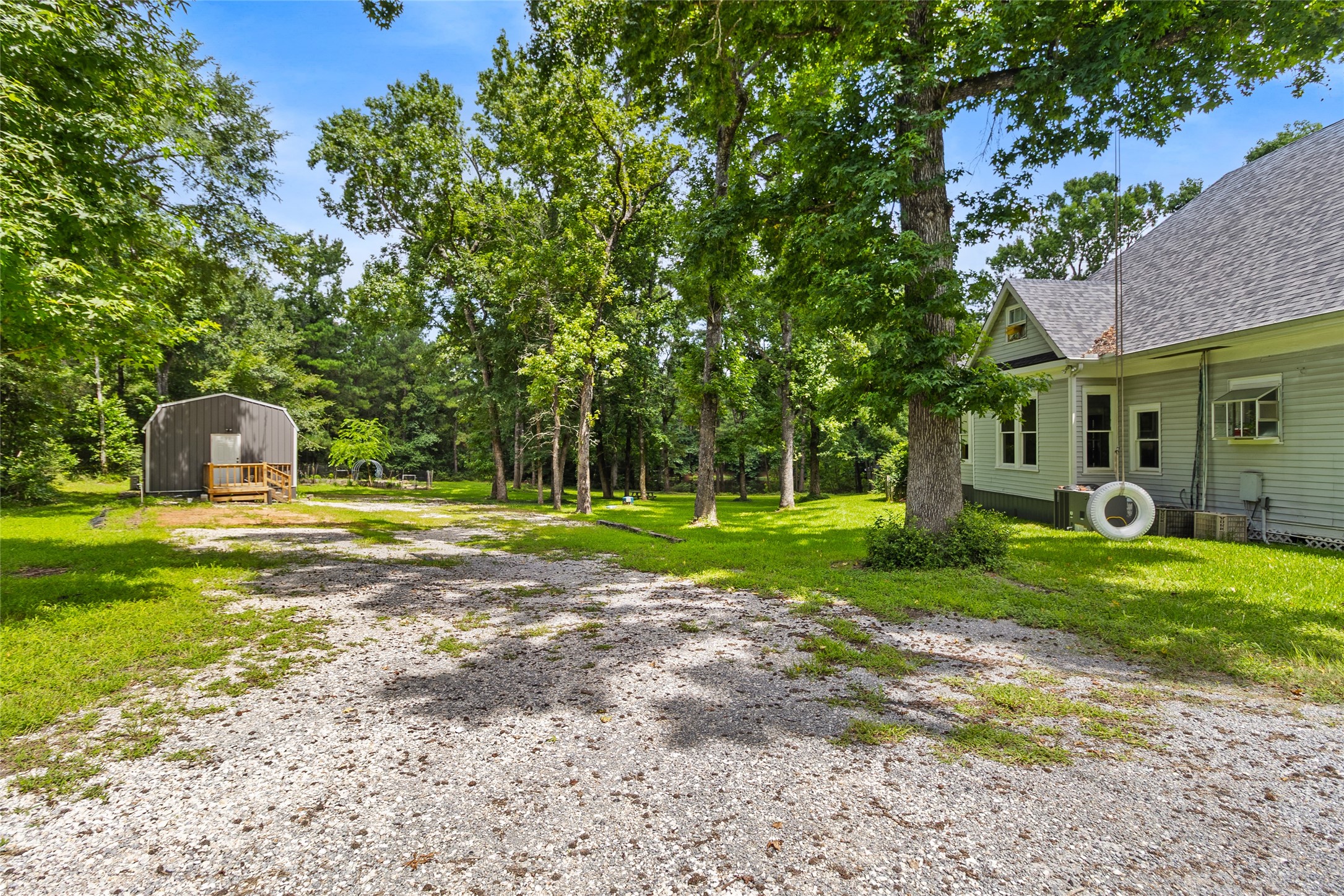 38 Darrell White Road Huntsville, TX 77340 - Photo 36 of 49 a house view with a garden space