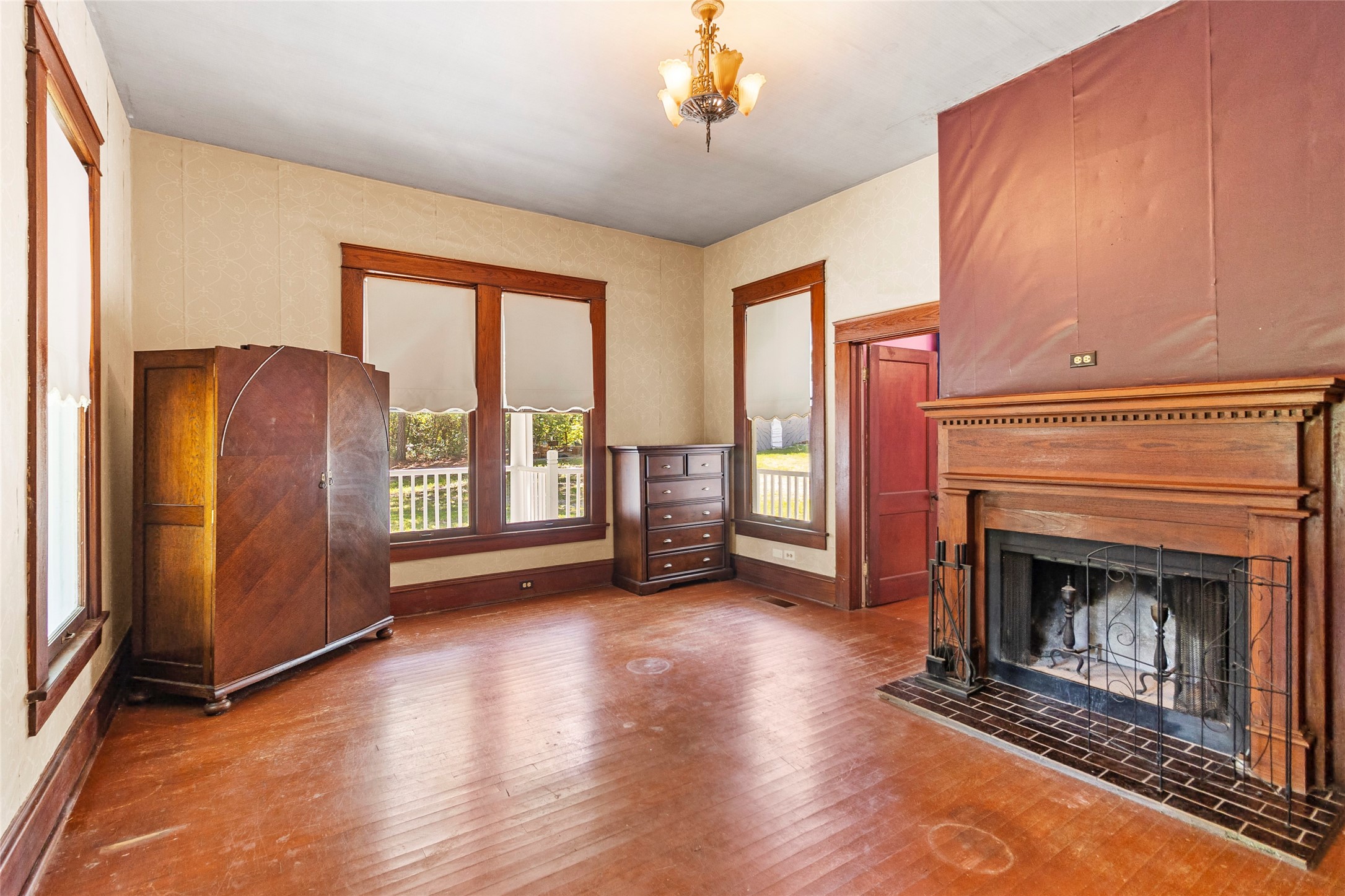 38 Darrell White Road Huntsville, TX 77340 - Photo 8 of 49 a living room with furniture and a fireplace
