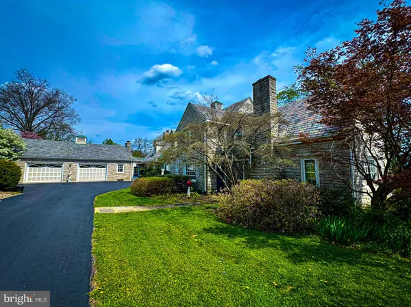 front view of a house with a garden