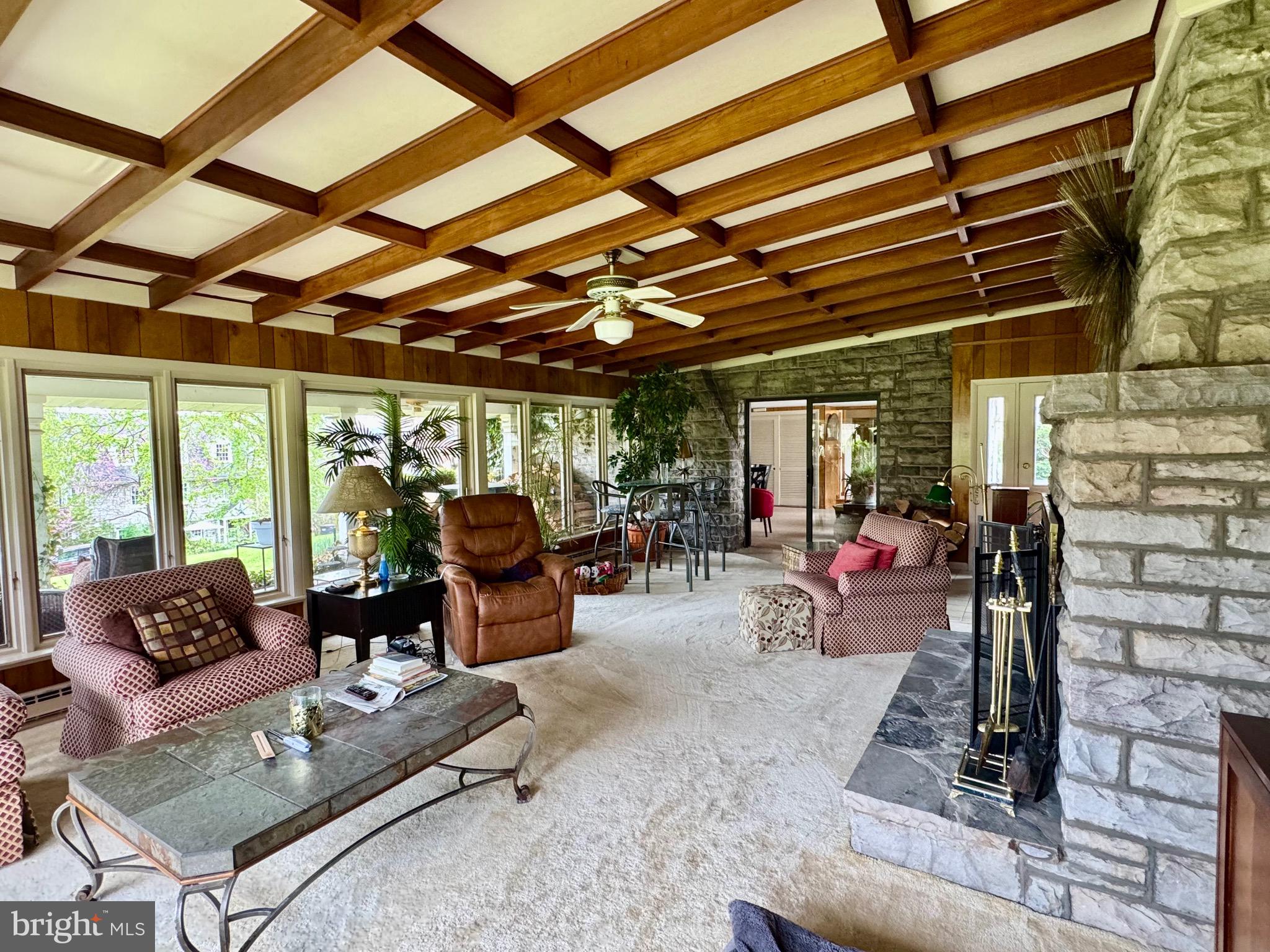 2251 Moore Street Huntingdon, PA 16652 - Photo 61 of 106 sunroom with front entrance to patio